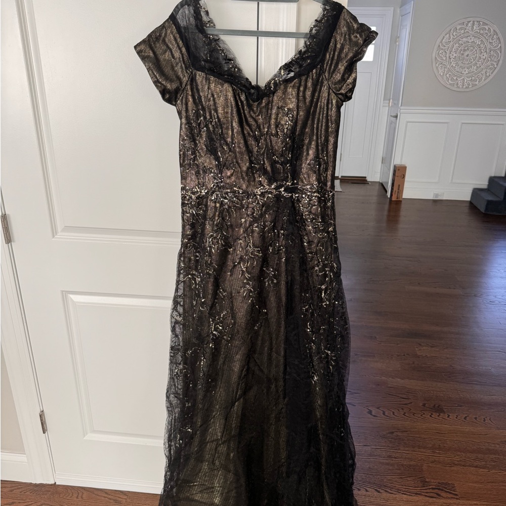 Never worn mother of the bride dress. Tags still on.
